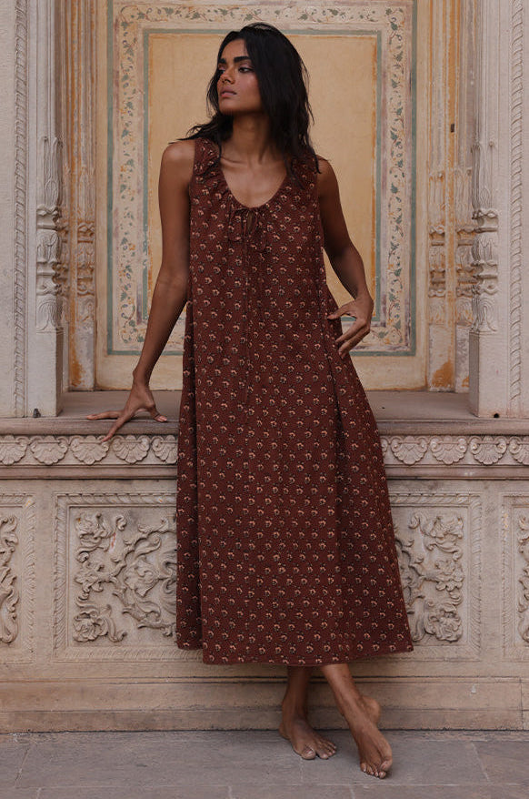 Sundress Midi Almond — studio full length front view, model facing camera, sleeveless sundress with tie-gather neckline, flowing A-line midi skirt, hand block print almond cotton, artisan Jaipur India | Daughters of India